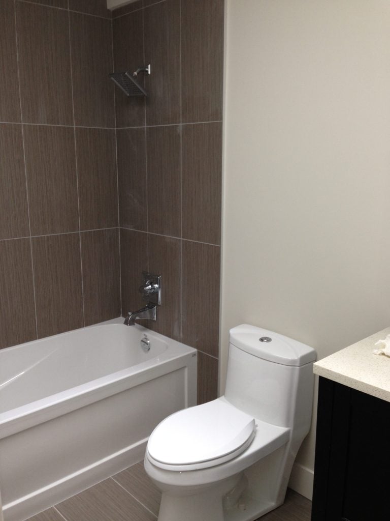 toilet, bathtub, and sink